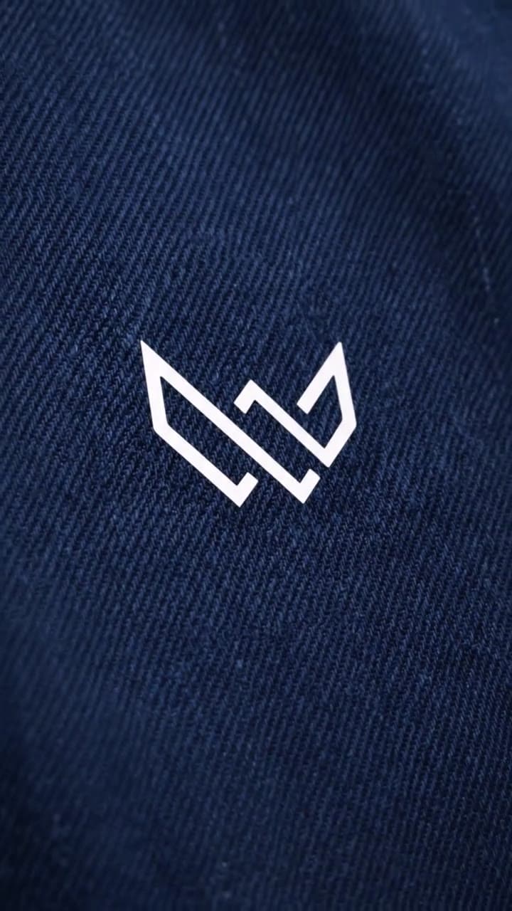 Wearium logo embroidered on navy fabric